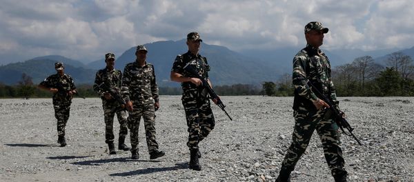Sashastra Seema Bal (SSB) troopers patrol near a polling station during the first phase of general election in Alipurduar district, in the eastern state of West Bengal, India, April 11, 2019 Sashastra Seema Bal (SSB) troopers patrol near a polling station during the first phase of general election in Alipurduar district, in the eastern state of West Bengal, India, April 11, 2019 - Sputnik International