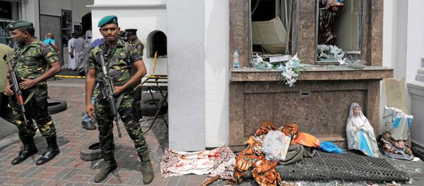Sri Lankan military officials stand guard in front of the St. Anthony's Shrine, Kochchikade church after an explosion in Colombo, Sri Lanka April 21, 2019. Sri Lankan military officials stand guard in front of the St. Anthony's Shrine, Kochchikade church after an explosion in Colombo, Sri Lanka April 21, 2019. - Sputnik International