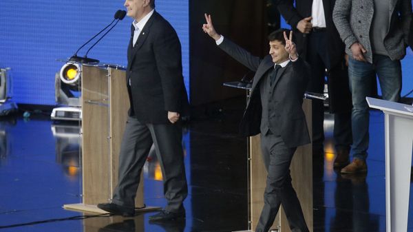 Presidential candidates, Ukrainian President Petro Poroshenko, left, and popular comedian Volodymyr Zelenskiy attend debates in the weekend presidential run-off at the Olympic stadium in Kiev, Ukraine - Sputnik International