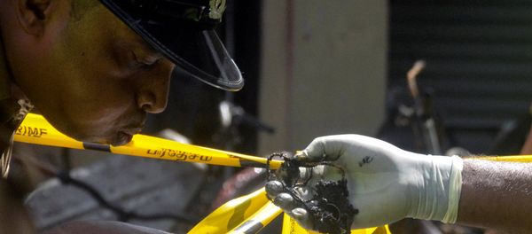 Sri Lankan Crime Division police officers inspect the explosion site at a church in Batticaloa, Sri Lanka April 21, 2019. Sri Lankan Crime Division police officers inspect the explosion site at a church in Batticaloa, Sri Lanka April 21, 2019. - Sputnik International