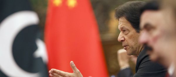 Pakistan's Prime Minister Imran Khan attends talks with Chinese President Xi Jinping (not pictured) at the Great Hall of the People in Beijing, Friday, Nov. 2, 2018 - Sputnik International