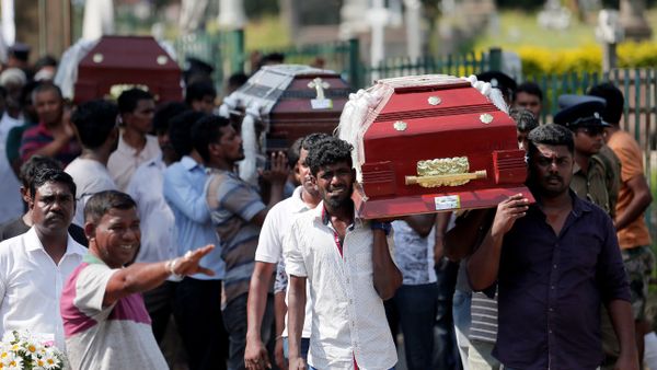 Coffins of victims are carried during a mass for victims, two days after a string of suicide bomb attacks on churches and luxury hotels across the island on Easter Sunday, in Colombo, Sri Lanka April 23, 2019. Coffins of victims are carried during a mass for victims, two days after a string of suicide bomb attacks on churches and luxury hotels across the island on Easter Sunday, in Colombo, Sri Lanka April 23, 2019. - Sputnik International