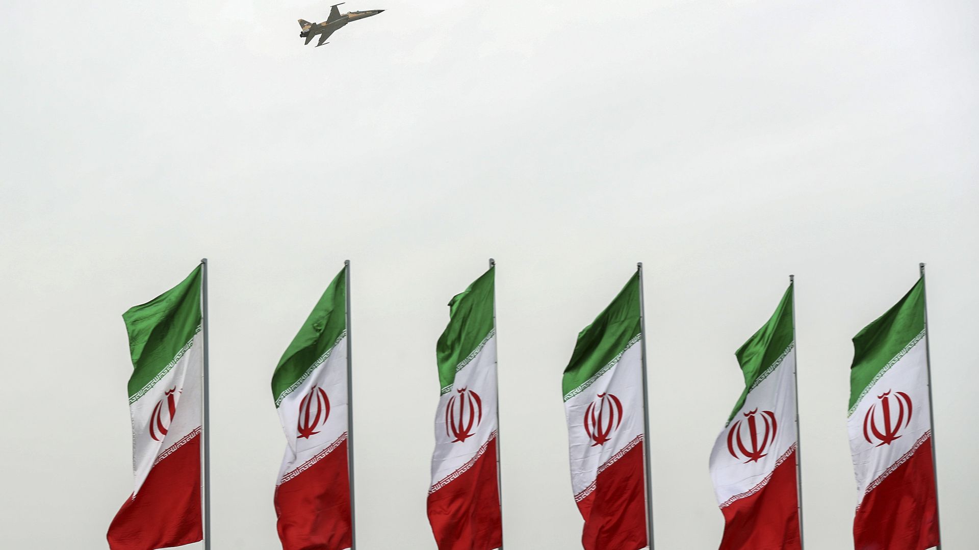 In this photo released by the official website of the office of the Iranian Presidency, a fighter jet flies over Iranian flags during the army parade commemorating National Army Day in front of the shrine of the late revolutionary founder Ayatollah Khomeini, just outside Tehran, Iran, Thursday, April 18, 2019 In this photo released by the official website of the office of the Iranian Presidency, a fighter jet flies over Iranian flags during the army parade commemorating National Army Day in front of the shrine of the late revolutionary founder Ayatollah Khomeini, just outside Tehran, Iran, Thursday, April 18, 2019 - Sputnik International, 1920, 10.05.2021