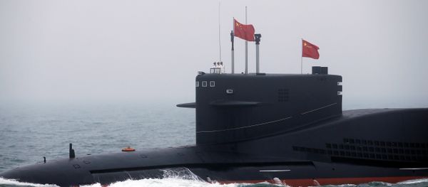 Chinese Navy's nuclear-powered submarine Long March 11 takes part in a naval parade off the eastern port city of Qingdao, to mark the 70th anniversary of the founding of Chinese People's Liberation Army Navy Chinese Navy's nuclear-powered submarine Long March 11 takes part in a naval parade off the eastern port city of Qingdao, to mark the 70th anniversary of the founding of Chinese People's Liberation Army Navy - Sputnik International