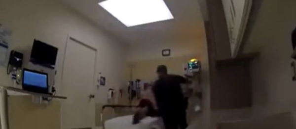 Florida cop investigated by department's internal affairs after body camera footage shows him punching a suspect handcuffed to a hospital bed Florida cop investigated by department's internal affairs after body camera footage shows him punching a suspect handcuffed to a hospital bed - Sputnik International