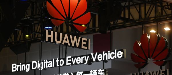 Signs are displayed at the Huawei stand at the Shanghai Auto Show in Shanghai on April 17, 2019 - Sputnik International