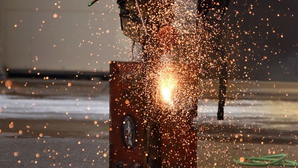 Staff Sgt. Patrick Hadfield, 341st Security Forces Group Tactical Response Force member, demonstrates thermal breaching using a broco torch Nov. 18 at Malmstrom Air Force, Mont. The torch is an extremely powerful tool that has the capability of cutting thick steel, aluminum, cast iron and more. - Sputnik International