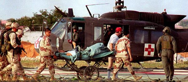 US helicopter pilot Michael Durant is carried on a stretcher to the helicopter from the 46th Combat Support hospital. - Sputnik International