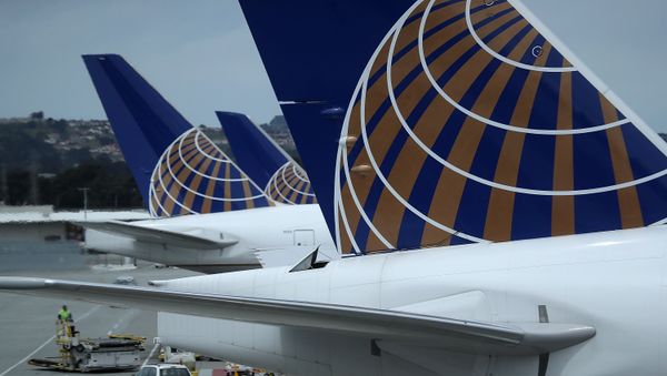 United Airlines planes sit on the tarmac at San Francisco International Airport on April 18, 2018 in San Francisco, California. United Continental Holdings reported better than expected first quarter earnings with revenue of $9.03 billion compared to analyst expectations of $9.01 billion. - Sputnik International