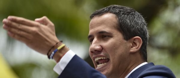 Venezuelan opposition leader and self-proclaimed interim president Juan Guaido addresses supporters during a meeting at Chacao neighbourhood in Caracas on April 19, 2019. Venezuelan opposition leader and self-proclaimed interim president Juan Guaido addresses supporters during a meeting at Chacao neighbourhood in Caracas on April 19, 2019. - Sputnik International