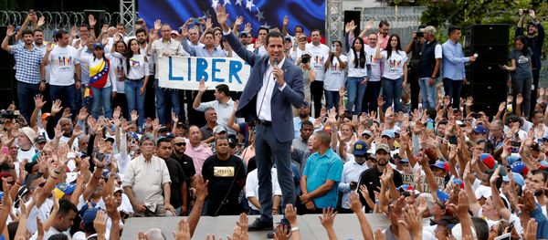 Venezuelan opposition leader Juan Guaido, who many nations have recognised as the country's rightful interim ruler, speaks during a swearing-in ceremony for supporters in Caracas, Venezuela April 27, 2019 Venezuelan opposition leader Juan Guaido, who many nations have recognised as the country's rightful interim ruler, speaks during a swearing-in ceremony for supporters in Caracas, Venezuela April 27, 2019 - Sputnik International