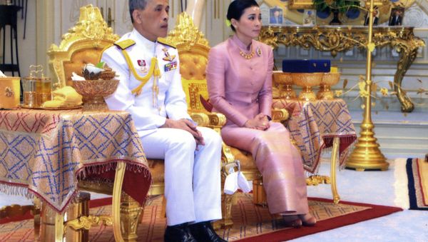 In this photo released by Bureau of the Royal Household ,Thailand's King Maha Vajiralongkorn Bodindradebayavarangkun, left, sits with Queen Suthida Vajiralongkorn Na Ayudhya at Ampornsan Throne Hall in Bangkok, Thailand, Wednesday, May 1, 2019. - Sputnik International