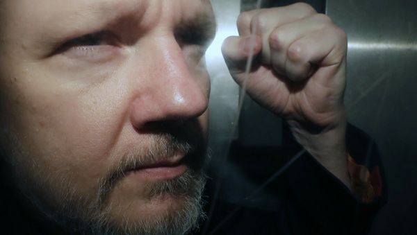 WikiLeaks founder Julian Assange being taken from court, where he appeared on charges of jumping British bail seven years ago, in London, Wednesday May 1, 2019 - Sputnik International