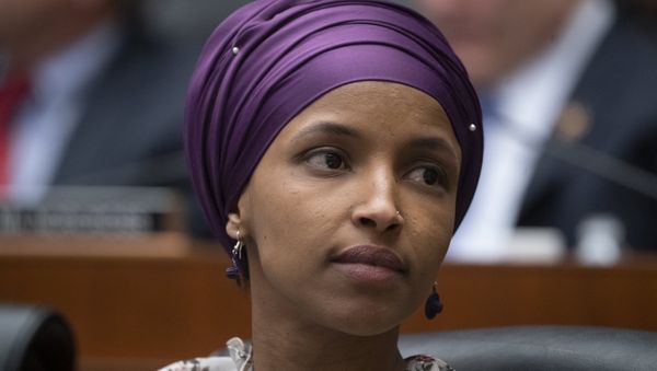 In this March 6, 2019, file photo, Rep. Ilhan Omar, D-Minn., sits with fellow Democrats on the House Education and Labor Committee during a bill markup, on Capitol Hill in Washington - Sputnik International