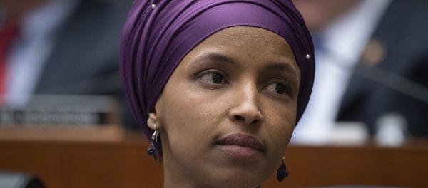 In this March 6, 2019, file photo, Rep. Ilhan Omar, D-Minn., sits with fellow Democrats on the House Education and Labor Committee during a bill markup, on Capitol Hill in Washington - Sputnik International