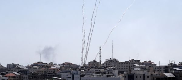A picture taken from the Gaza Strip on May 4, 2019 shows missiles being launched toward Israel. A barrage of around 50 rockets was fired at Israel from the Gaza Strip on Saturday and dozens were intercepted by air defences, the Israeli army said. A picture taken from the Gaza Strip on May 4, 2019 shows missiles being launched toward Israel. A barrage of around 50 rockets was fired at Israel from the Gaza Strip on Saturday and dozens were intercepted by air defences, the Israeli army said. - Sputnik International