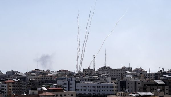 A picture taken from the Gaza Strip on May 4, 2019 shows missiles being launched toward Israel. A barrage of around 50 rockets was fired at Israel from the Gaza Strip on Saturday and dozens were intercepted by air defences, the Israeli army said. A picture taken from the Gaza Strip on May 4, 2019 shows missiles being launched toward Israel. A barrage of around 50 rockets was fired at Israel from the Gaza Strip on Saturday and dozens were intercepted by air defences, the Israeli army said. - Sputnik International