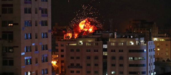 A ball of fire is seen during an Israeli air strike in Gaza City May 4, 2019 - Sputnik International