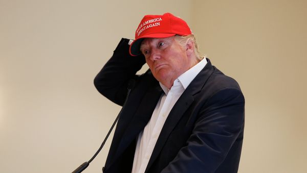 US Presidential Candidate Donald Trump answers questions from the media at a press conference during a visit to his Scottish golf course Turnberry Action - Sputnik International