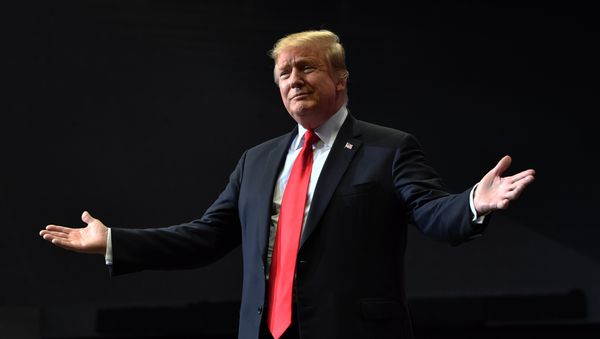 US President Donald Trump arrives for a campaign rally in Grand Rapids, Michigan on March 28, 2019 - Sputnik International