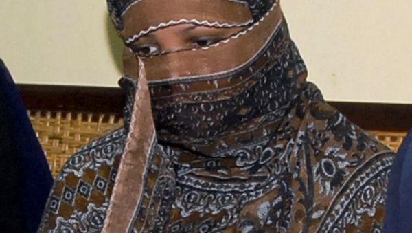 In this Nov. 20, 2010, file photo, Asia Bibi, a Pakistani Christian woman, listens to officials at a prison in Sheikhupura near Lahore, Pakistan. - Sputnik International