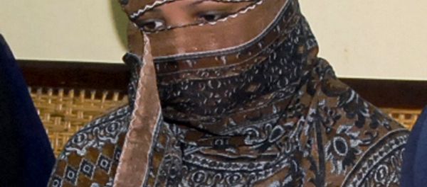 In this Nov. 20, 2010, file photo, Asia Bibi, a Pakistani Christian woman, listens to officials at a prison in Sheikhupura near Lahore, Pakistan. - Sputnik International