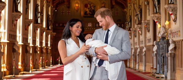 Britain's Prince Harry and Meghan, Duchess of Sussex are seen with their baby son, who was born on Monday morning, during a photocall in St George's Hall at Windsor Castle, in Berkshire, Britain May 8, 2019 Britain's Prince Harry and Meghan, Duchess of Sussex are seen with their baby son, who was born on Monday morning, during a photocall in St George's Hall at Windsor Castle, in Berkshire, Britain May 8, 2019 - Sputnik International
