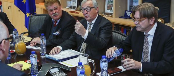 European Commission President Jean-Claude Juncker, center right, meets with members of the Brexit steering committee European Parliament chief Brexit official Guy Verhofstadt, right, and Member of European Parliament Elmer Brock at EU headquarters in Brussels on Monday, Dec. 4, 2017. European Commission President Jean-Claude Juncker, center right, meets with members of the Brexit steering committee European Parliament chief Brexit official Guy Verhofstadt, right, and Member of European Parliament Elmer Brock at EU headquarters in Brussels on Monday, Dec. 4, 2017. - Sputnik International
