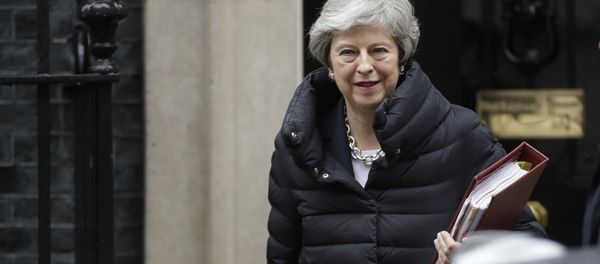 British Prime Minister Theresa May leaves 10 Downing Street in London, to attend Prime Minister's Questions at the Houses of Parliament, Wednesday, May 8, 2019 British Prime Minister Theresa May leaves 10 Downing Street in London, to attend Prime Minister's Questions at the Houses of Parliament, Wednesday, May 8, 2019 - Sputnik International