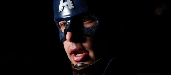 Avengers fan Griffin Reina dresses as Captain America at the TCL Chinese Theatre in Hollywood as he attends the opening screening of Avengers: Endgame in Los Angeles, California, U.S., April 25, 2019 Avengers fan Griffin Reina dresses as Captain America at the TCL Chinese Theatre in Hollywood as he attends the opening screening of Avengers: Endgame in Los Angeles, California, U.S., April 25, 2019 - Sputnik International