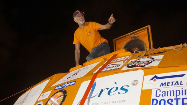 Frenchman Jean-Jacques Savin, who floated across the Atlantic in a custom-made barrel for nearly 100 days, stands on his barrel aboard the ship Friendship after being brought back to land in Fort-de-France, on the French Caribbean island of Martinique, on May 9, 2019. - Sputnik International