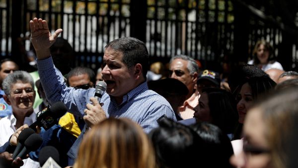 Luis Florido, lawmaker of the Venezuelan coalition of opposition parties (MUD), speaks during a gathering with opposition supporters in Caracas, Venezuela March 17, 2018. REUTERS/Marco Bello/File Photo - Sputnik International