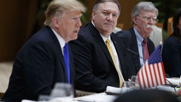 Secretary of State Mike Pompeo, center, and national security adviser John Bolton, right, listen as President Donald Trump speaks during a meeting with Vietnamese Prime Minister Nguyen Xuan Phuc at the Office of Government Hall, Wednesday, Feb. 27, 2019, in Hanoi, Vietnam. Secretary of State Mike Pompeo, center, and national security adviser John Bolton, right, listen as President Donald Trump speaks during a meeting with Vietnamese Prime Minister Nguyen Xuan Phuc at the Office of Government Hall, Wednesday, Feb. 27, 2019, in Hanoi, Vietnam. - Sputnik International