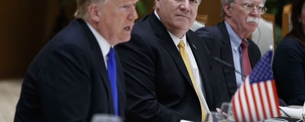 Secretary of State Mike Pompeo, center, and national security adviser John Bolton, right, listen as President Donald Trump speaks during a meeting with Vietnamese Prime Minister Nguyen Xuan Phuc at the Office of Government Hall, Wednesday, Feb. 27, 2019, in Hanoi - Sputnik International
