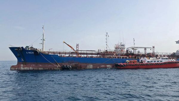 A picture taken on May 13, 2019 off the coast of the Gulf emirate of Fujairah shows the A. Michel tanker under the flag of the United Arab Emirates, one of the four tankers damaged in alleged sabotage attacks in the Gulf the previous day. - Sputnik International