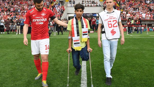 Iraqi boy Qassem Qadim, Hero of Award-Winning Photo of Stenin Contest Iraqi boy Qassem Qadim, Hero of Award-Winning Photo of Stenin Contest - Sputnik International