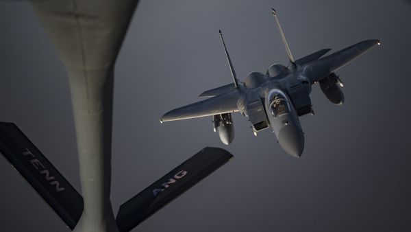 An Airman piloting an F-15C Eagle prepares to receive fuel from a KC-135 Stratotanker from the 28th Expeditionary Aerial Refueling Squadron, May 12, 2019, at an undisclosed location. The 28th EARS maintains constant presence in the U.S. Air Forces Central Command area of responsibility, supporting U.S. and Coalition aircraft in various operations conducted in Iraq, Syria, and Afghanistan. - Sputnik International
