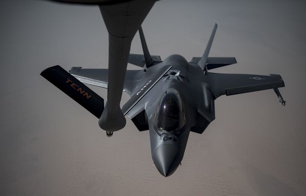 An Airman piloting an F-35A Lightning II receives fuel from a KC-135 Stratotanker from the 28th Expeditionary Aerial Refueling Squadron, May 12, 2019, at an undisclosed location. The 28th EARS maintains constant presence in the U.S. Air Forces Central Command area of responsibility, supporting U.S. and Coalition aircraft in various operations conducted in Iraq, Syria, and Afghanistan. - Sputnik International