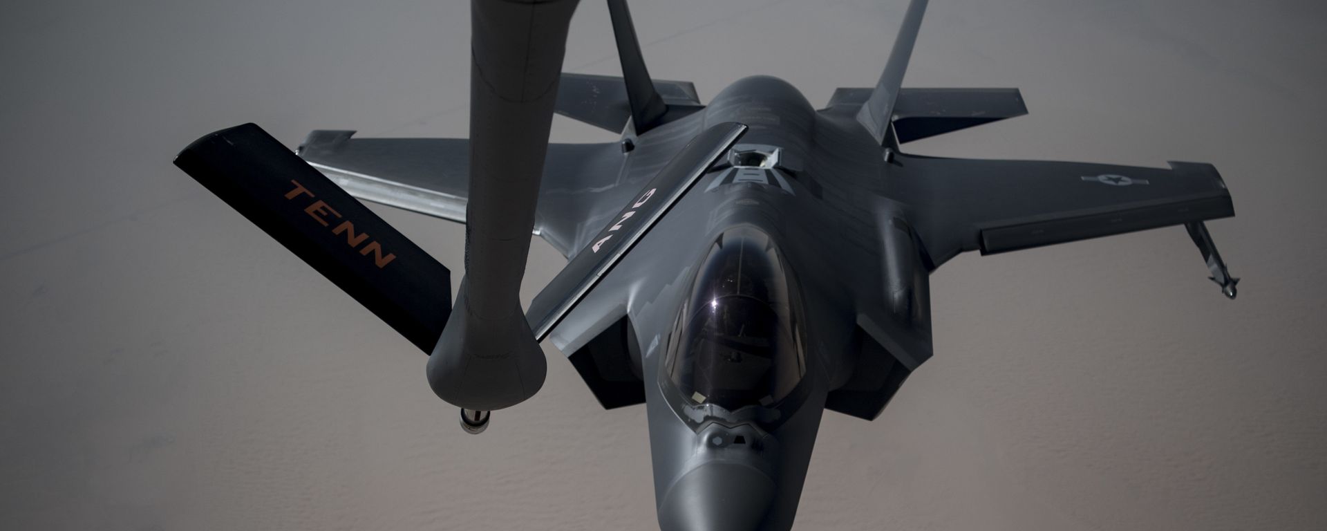An Airman piloting an F-35A Lightning II receives fuel from a KC-135 Stratotanker from the 28th Expeditionary Aerial Refueling Squadron, May 12, 2019, at an undisclosed location. The 28th EARS maintains constant presence in the U.S. Air Forces Central Command area of responsibility, supporting U.S. and Coalition aircraft in various operations conducted in Iraq, Syria, and Afghanistan. - Sputnik International, 1920, 03.02.2024