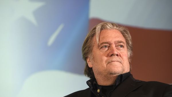 Steve Bannon, former strategic adviser to U.S. President Donald Trump and Lanny Davis, former special adviser in the White House and supporter of Hillary Clinton (unseen) attend a discussion meeting focussing on U.S. developments on May 22, 2018, in Prague Steve Bannon, former strategic adviser to U.S. President Donald Trump and Lanny Davis, former special adviser in the White House and supporter of Hillary Clinton (unseen) attend a discussion meeting focussing on U.S. developments on May 22, 2018, in Prague - Sputnik International