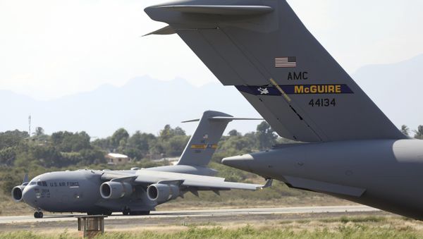 A second United States Air Force C-17 cargo plane loaded with humanitarian aid lands at Camilo Daza airport in Cucuta, Colombia, Saturday, Feb. 16, 2019. - Sputnik International
