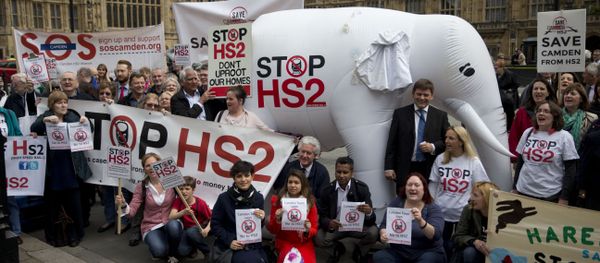 Demonstrators against HS2 pose outside the UK Parliament in 2014 with a giant white elephant - Sputnik International