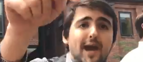 Carlos Ayala Quintero, a member of the Venezuelan opposition outside the embassy in Washington, DC, berates journalist Rania Khalek Carlos Ayala Quintero, a member of the Venezuelan opposition outside the embassy in Washington, DC, berates journalist Rania Khalek - Sputnik International