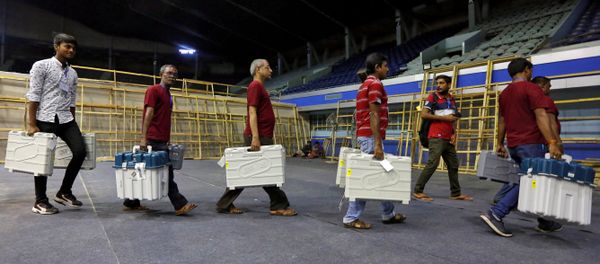 FILE PHOTO: Members of election staff carry Electronic Voting Machines (EVM) and Voter Verifiable Paper Audit Trail (VVPAT) machines after collecting them from a distribution centre at an indoor stadium ahead of the seventh and last phase of general election, in Kolkata, India, May 18, 2019. FILE PHOTO: Members of election staff carry Electronic Voting Machines (EVM) and Voter Verifiable Paper Audit Trail (VVPAT) machines after collecting them from a distribution centre at an indoor stadium ahead of the seventh and last phase of general election, in Kolkata, India, May 18, 2019. - Sputnik International