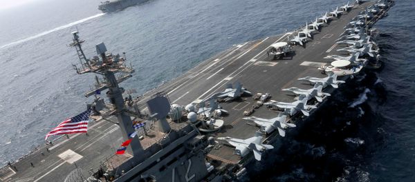 The Nimitz-class aircraft carrier USS Abraham Lincoln (CVN 72) and the Wasp-class Amphibious Assault Ship USS Kearsarge (LHD 3) sail alongside, as the Abraham Lincoln Carrier Strike Group (ABECSG) and Kearsarge Amphibious Ready Group (KSGARG) conduct joint operations, in the U.S. 5th Fleet area of operations in the Arabian Sea, May 17, 2019 The Nimitz-class aircraft carrier USS Abraham Lincoln (CVN 72) and the Wasp-class Amphibious Assault Ship USS Kearsarge (LHD 3) sail alongside, as the Abraham Lincoln Carrier Strike Group (ABECSG) and Kearsarge Amphibious Ready Group (KSGARG) conduct joint operations, in the U.S. 5th Fleet area of operations in the Arabian Sea, May 17, 2019 - Sputnik International