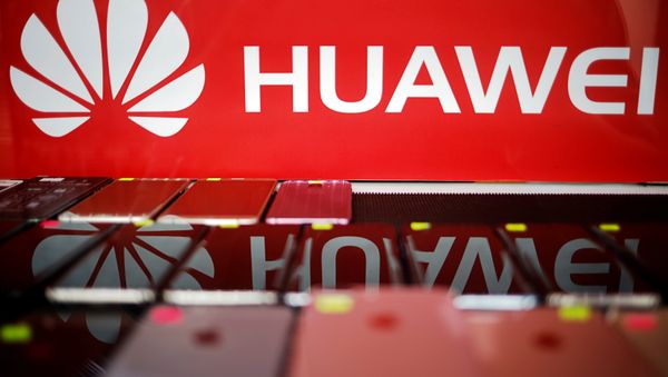 The logo of Huawei is pictured at a mobile phone shop in Singapore, May 21, 2019 The logo of Huawei is pictured at a mobile phone shop in Singapore, May 21, 2019 - Sputnik International