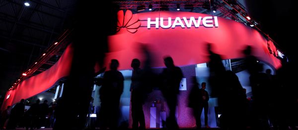Visitors walk past Huawei's booth during Mobile World Congress in Barcelona, Spain, February 27, 2017 Visitors walk past Huawei's booth during Mobile World Congress in Barcelona, Spain, February 27, 2017 - Sputnik International