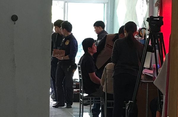 Montri Salangam (center) in police custody following his arrest in January 2018. - Sputnik International