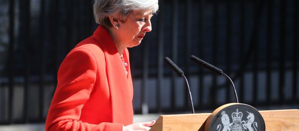 Britain's Prime Minister Theresa May reacts as she announces her resignation outside 10 Downing street in central London on May 24, 2019. - Sputnik International