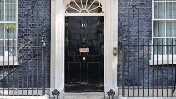 A view of the front door of 10 Downing street in central London on May 24, 2019. Beleaguered British Prime Minister Theresa May is expected to announce today when she will resign, according to reports, following a Conservative Party mutiny over her remaining in power. A view of the front door of 10 Downing street in central London on May 24, 2019. Beleaguered British Prime Minister Theresa May is expected to announce today when she will resign, according to reports, following a Conservative Party mutiny over her remaining in power. - Sputnik International